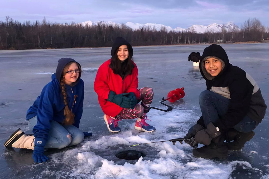 students ice fishing